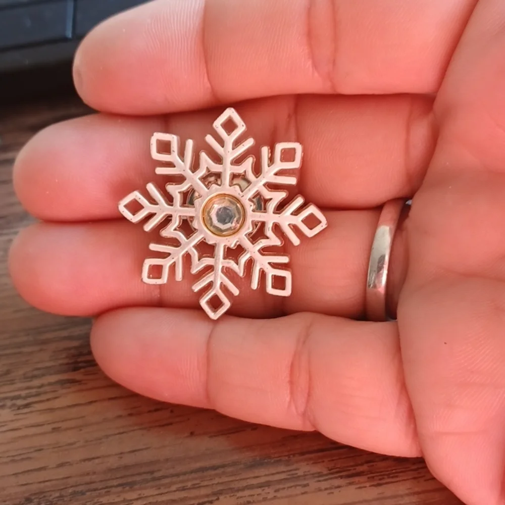 Snowflake pin, aluminum look, rhinestone center, approx 1